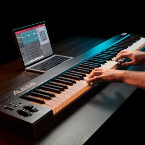 The Q88 MKII from Alesis is an 88-key USB/MIDI keyboard controller featuring semi-weighted, velocity-sensitive keys, packaged in a compact and portable form. Suitable for both stage and studio use, the controller features assignable pitch and modulation wheels along with octave transpose buttons and a data slider.